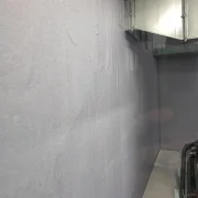 FAS Kabinenschutzfolie für Anlagenwände/-böden - zweiseitig klebend an der Wand